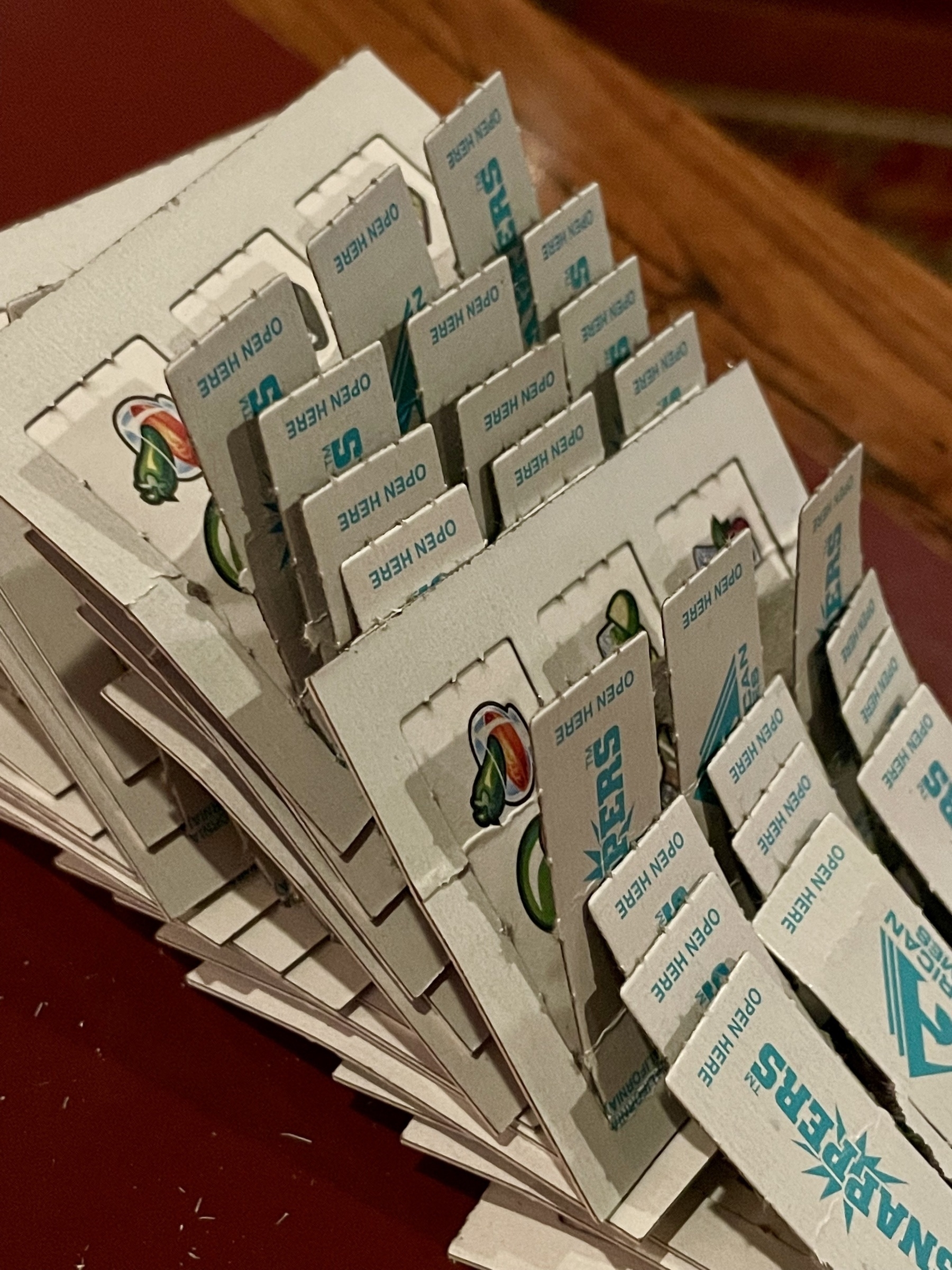 stack of Snappers-branded pull-tabs on table