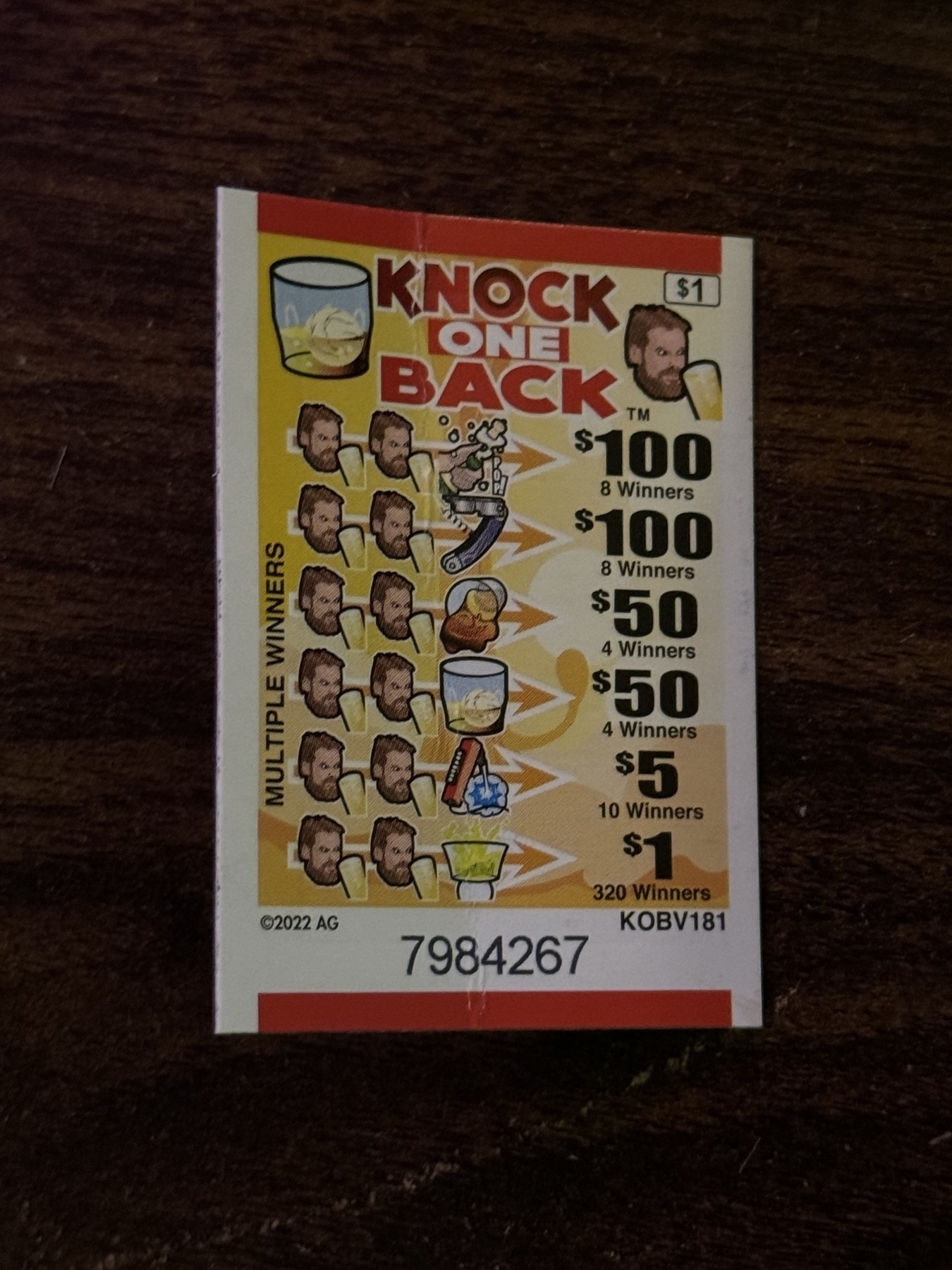 pull tab back side with various winning scenarios featuring a white guy with beer/drinks for symbols